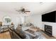 Comfortable living room featuring a fireplace, large TV, and stylish decor at 7935 Parklane Ct # A, North Charleston, SC 29418