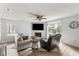 Inviting living room with a fireplace, lots of natural light, and an open concept design at 7935 Parklane Ct # A, North Charleston, SC 29418