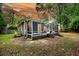 Beautiful home and backyard with a sunroom, hot tub, and outdoor patio. Perfect for entertaining or relaxing at 8 Pony Ln, Charleston, SC 29407
