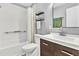 Bathroom featuring a sink, dark wood cabinet, and bath/shower combo at 8 Pony Ln, Charleston, SC 29407