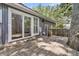 Exterior deck area with sliding glass door entry to home's sunroom. Large and spacious at 8 Pony Ln, Charleston, SC 29407