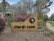Marsh Cove entrance sign featuring unique logo and landscaping at 8 Pony Ln, Charleston, SC 29407