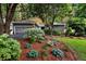 Charming single-story home with well-manicured front yard and mature landscaping at 8 Pony Ln, Charleston, SC 29407