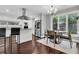 Modern kitchen with stainless steel appliances and a dining area, perfect for everyday meals at 8 Pony Ln, Charleston, SC 29407