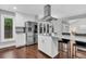 Bright kitchen featuring stainless steel appliances, a modern island, and ample cabinet space at 8 Pony Ln, Charleston, SC 29407