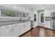 Modern kitchen featuring white cabinets, gray countertops, and stainless steel appliances at 8 Pony Ln, Charleston, SC 29407