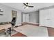 Bright office with ample space, clean walls, a fan and hardwood floors at 8 Pony Ln, Charleston, SC 29407