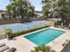 Community pool next to a tennis court, offering recreation and relaxation for residents at 8 Pony Ln, Charleston, SC 29407