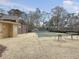 Exterior view of a community tennis court, offering recreation and exercise for the residents at 8 Pony Ln, Charleston, SC 29407