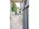 Private courtyard with tiled patio and seating at 84 Bull St # F, Charleston, SC 29401