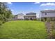 Large, grassy backyard perfect for outdoor activities and relaxation at 849 Kirby Ct, Charleston, SC 29414