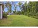 Expansive backyard with mature trees, perfect for outdoor activities at 849 Kirby Ct, Charleston, SC 29414