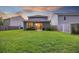 The backyard features a well-maintained lawn, privacy fence, and a patio for outdoor enjoyment at 849 Kirby Ct, Charleston, SC 29414