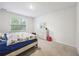 Bright bedroom with a comfortable bed, dresser, and ample natural light from the window at 849 Kirby Ct, Charleston, SC 29414