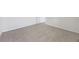 Neutral carpeted floor in an empty bedroom, with white painted baseboards and door at 849 Kirby Ct, Charleston, SC 29414