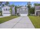 Charming two-story home featuring a driveway and a well-maintained lawn at 849 Kirby Ct, Charleston, SC 29414