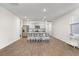 Bright, open kitchen with large island, stainless steel appliances, and eat-in barstools at 849 Kirby Ct, Charleston, SC 29414