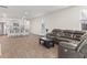 Open-concept living room flows into the kitchen with barstool seating and modern appliances at 849 Kirby Ct, Charleston, SC 29414