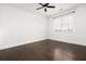 Minimalist bedroom with ceiling fan and hardwood floors at 861 Center Park St, Charleston, SC 29492