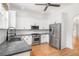 Modern kitchen featuring stainless steel appliances, white cabinets, and dark countertops at 861 Center Park St, Charleston, SC 29492