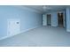 Bedroom with neutral carpet, ceiling fan, and multiple doorways to other rooms at 1005 Trotters Blvd, Summerville, SC 29483