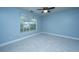 Cozy bedroom featuring plush carpet, a ceiling fan, and a window with a valance at 1005 Trotters Blvd, Summerville, SC 29483