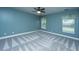 Bedroom features neutral walls, carpet, two windows and ceiling fan at 1005 Trotters Blvd, Summerville, SC 29483