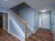 Entry foyer featuring wood laminate floors and stairway leading to the second floor at 1005 Trotters Blvd, Summerville, SC 29483