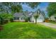 Charming two-story home with landscaped yard, driveway and attached two car garage at 1005 Trotters Blvd, Summerville, SC 29483