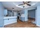 Kitchen with updated appliances, wood floors and views into living room at 1005 Trotters Blvd, Summerville, SC 29483