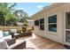 Cozy back patio with outdoor furniture, grilling station and ample outdoor space at 1015 Jacksnipe Ln, Mount Pleasant, SC 29464