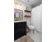 Updated bathroom includes a new vanity, floating shelves, neutral paint and updated fixtures at 1015 Jacksnipe Ln, Mount Pleasant, SC 29464