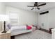 Cozy bedroom with neutral colors, a single bed, patterned rug, and a ceiling fan at 1015 Jacksnipe Ln, Mount Pleasant, SC 29464