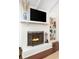 Cozy fireplace featuring a brick surround, decor, and wood floors at 1015 Jacksnipe Ln, Mount Pleasant, SC 29464