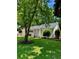 Delightful home featuring mature trees, attractive landscaping, and a verdant lawn at 1015 Jacksnipe Ln, Mount Pleasant, SC 29464