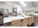 Modern kitchen featuring white cabinets, stainless steel appliances, and stone countertops at 1015 Jacksnipe Ln, Mount Pleasant, SC 29464