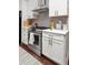 Modern kitchen with stainless steel appliances, white cabinets, and stone countertops at 1015 Jacksnipe Ln, Mount Pleasant, SC 29464