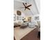 Cozy living room featuring accent chairs, wood floors, a coffee table, and decor at 1015 Jacksnipe Ln, Mount Pleasant, SC 29464