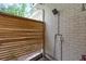 Modern outdoor shower with a privacy screen and minimalist design at 1015 Jacksnipe Ln, Mount Pleasant, SC 29464