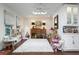 Spacious playroom filled with toys, a play tent, and storage cabinets, with hardwood floors and ample lighting at 1015 Jacksnipe Ln, Mount Pleasant, SC 29464