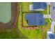 Scenic aerial view of backyard featuring a pond and green landscaping at 1059 Fitzgerald Ct, Summerville, SC 29485