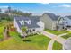 Attractive home with a covered front porch and lush landscaping on a well-maintained lot at 1059 Fitzgerald Ct, Summerville, SC 29485