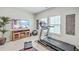 Well-equipped home gym featuring a treadmill, television, and ample space for a healthy lifestyle at 1059 Fitzgerald Ct, Summerville, SC 29485