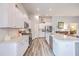 Bright kitchen with white cabinets, stainless appliances, large island, and open floor plan at 1059 Fitzgerald Ct, Summerville, SC 29485