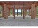 Lakeside pavilion with brick columns providing a relaxing space with views of the lake, perfect for gatherings and events at 1059 Fitzgerald Ct, Summerville, SC 29485