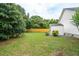 Large backyard with a storage shed and privacy fence at 1077 Farmington Rd, Charleston, SC 29412