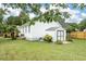 View of the backyard with a shed, lawn, and view of the back of the home at 1077 Farmington Rd, Charleston, SC 29412