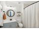 Cozy bathroom features shiplap wall, shelving, and a modern vanity at 1077 Farmington Rd, Charleston, SC 29412