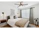 Bedroom with lots of light from the window, stylish decorations, and wooden floors at 1077 Farmington Rd, Charleston, SC 29412
