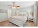 Comfortable bedroom with ceiling fan, wooden floors, and a decorative rug at 1077 Farmington Rd, Charleston, SC 29412